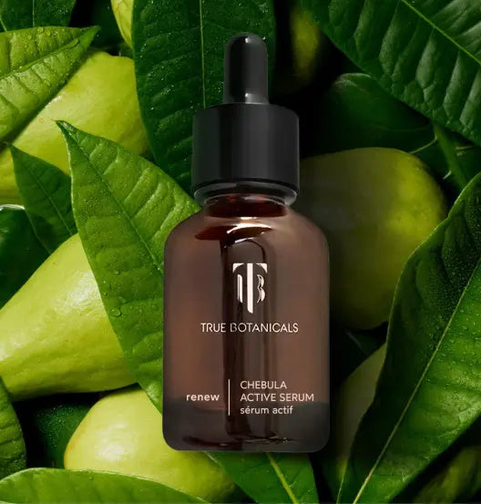 True Botanicals’ renew oil in a bed of pears and leaves